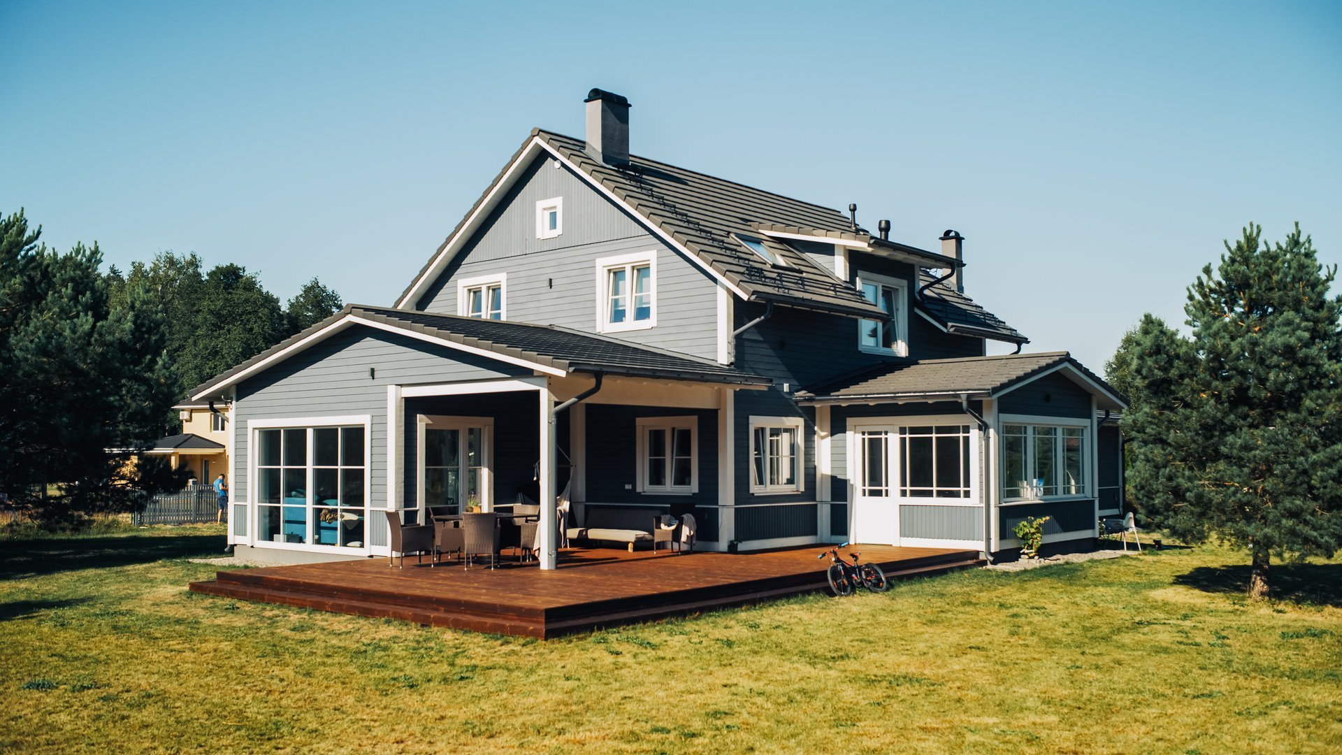 Beautiful American style home on a summer day with blue sky, residential property